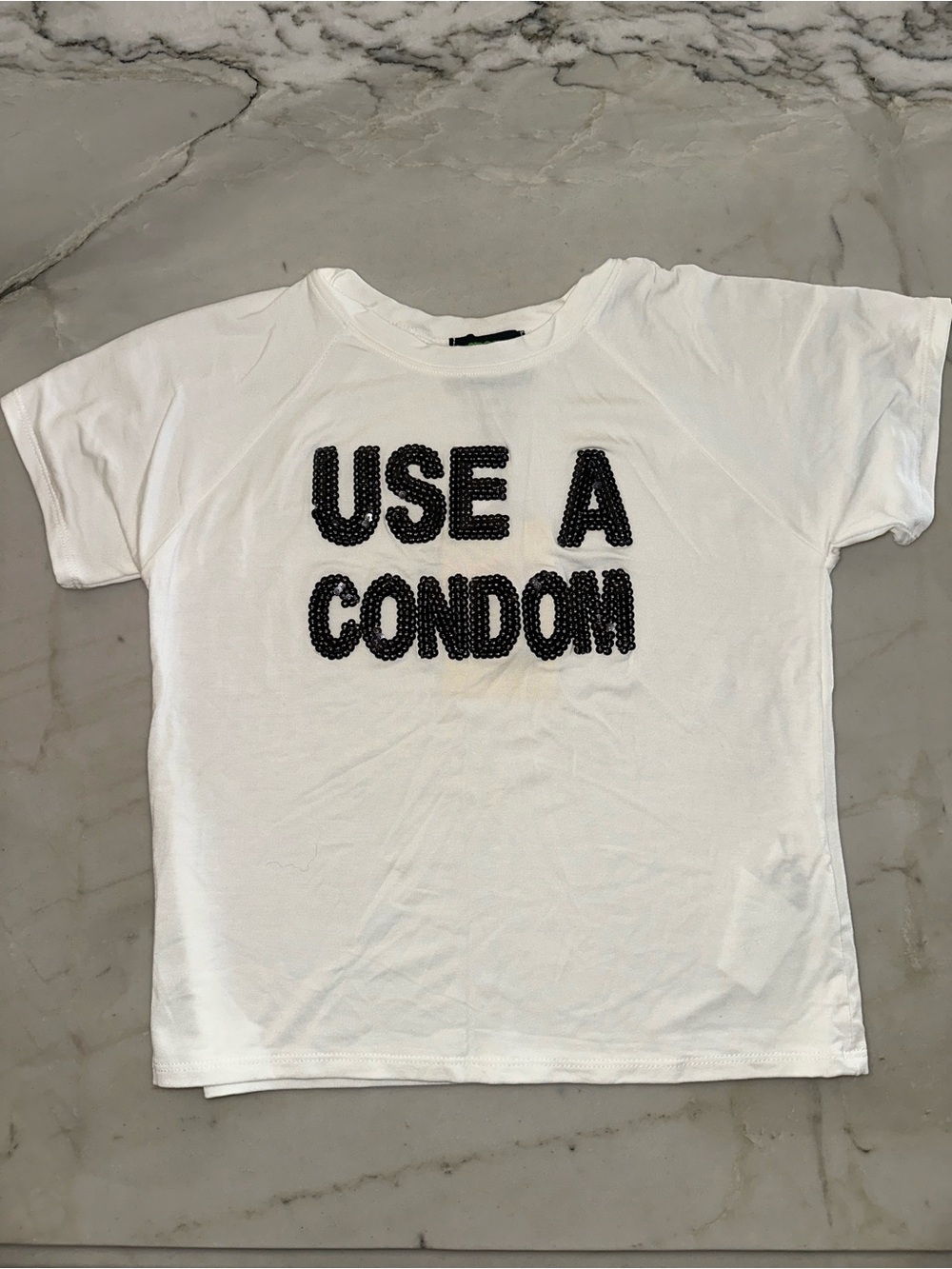O mighty White Statement Tee with Black sequin Text